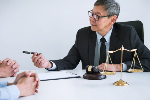 elder abuse lawyer speaking to clients.jpg